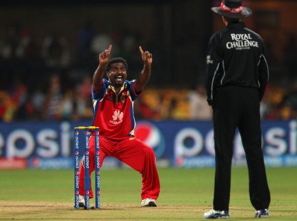 Muttiah Muralitharan appeals for a wicket during an Indian Premier League match