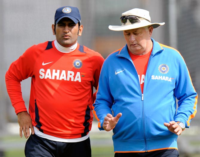 Mahendra Singh Dhoni (left) with India coach Duncan Fletcher