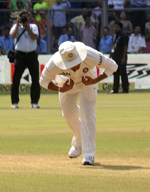 Sachin kisses the pitch before walking off.