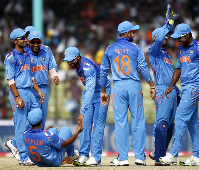 India's players celebrate a wicket during the Asia Cup match against Bangladesh in Fatullah.