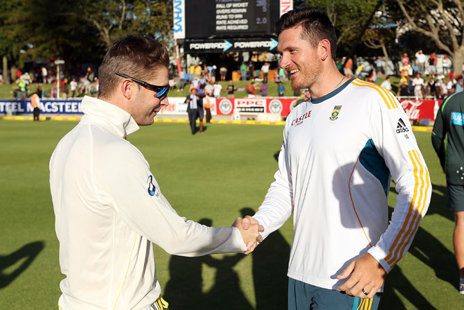 Michael Clarke of Australia shakes hands with Graeme Smith of South Africa after the third Test at Sahara Park Newlands