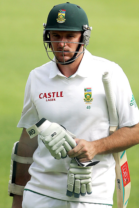 Graeme Smith leaves the field after getting out to Ryan Harris during Day 3 of the third Test between South Africa and Australia at Sahara Park Newlands on March 3, 2014