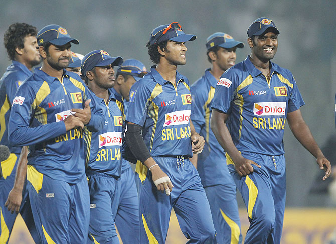 The Sri Lankan team celebrates a win