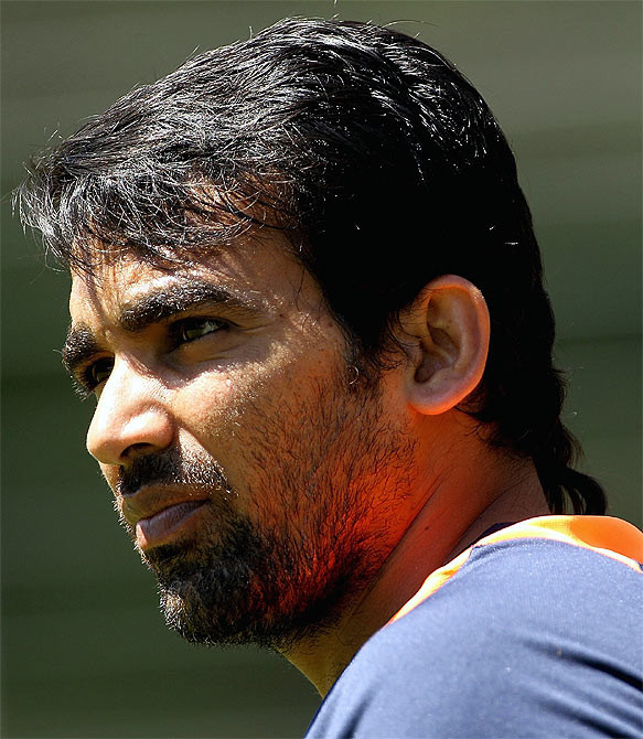 Zaheer Khan looks on during a nets session