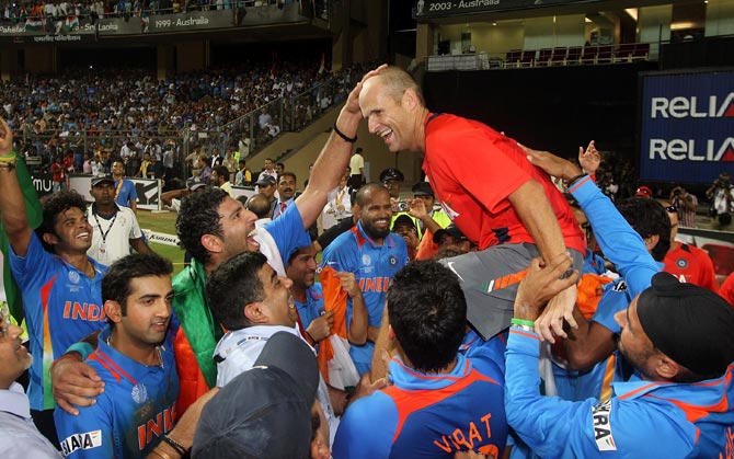 Gary Kirsten celebrates with the Indian team after winning the 2011 World Cup.