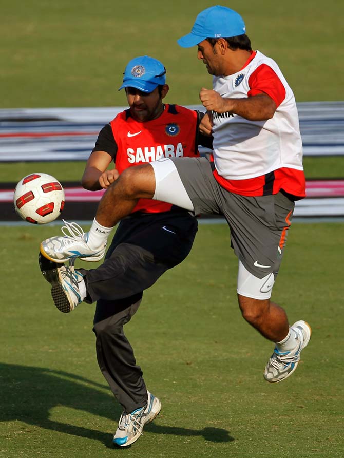 Gautam Gambhir and MS Dhoni play football