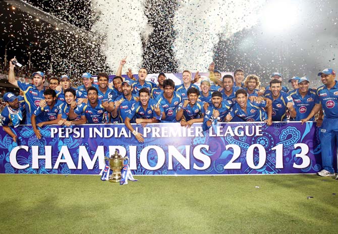 Mumbai Indians celebrate after winning the 2013 IPL