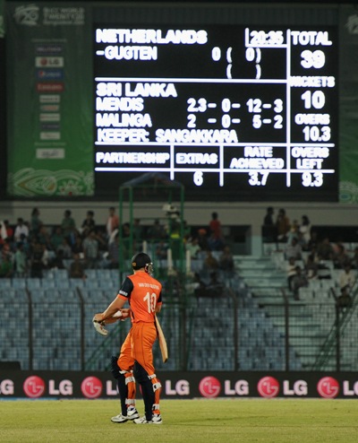 Timm van der Gugten of the Netherlands leaves the field after his team is bowled out for 39 runs
