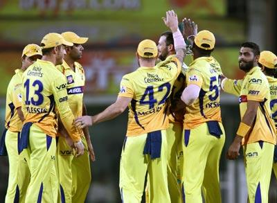 Chennai Super Kings players celebrate the run-out of Kolkata Knight Riders captain Gautam Gambhir