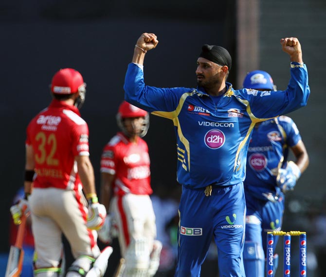 Harbhajan Singh celebrates after getting the wicket of Glenn Maxwell