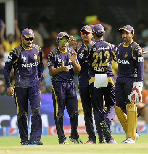 Kolkata Knight Riders players celebrate a wicket