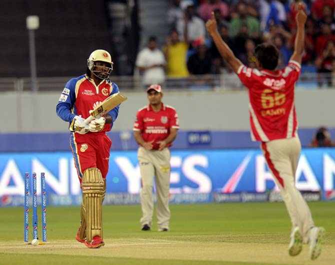 Chris Gayle being cleaned up by Sandeep Sharma