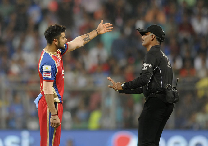 Virat Kohli having a word with the umpire