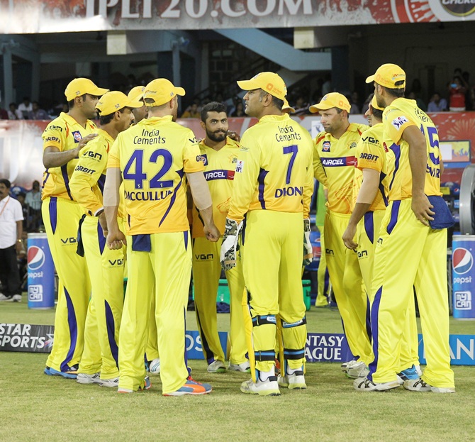 Chennai Super Kings players gather before the start of their match