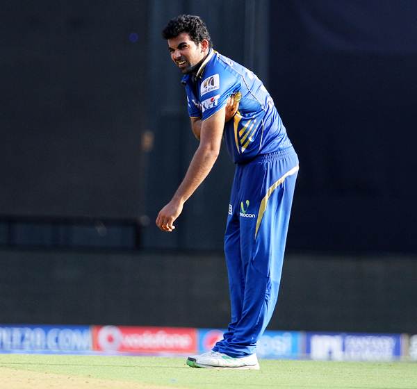 Zaheer Khan grimaces in pain after sending down a delivery in Mumbai Indians' match against Kings XI Punjab on May 3. 