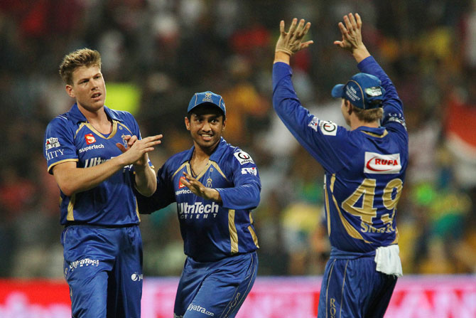 Rajasthan Royals' James Faulkner being congratulated by teammates