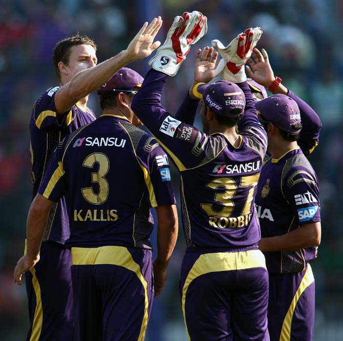 Morne Morkel (left) celebrates a wicket with his team mates.