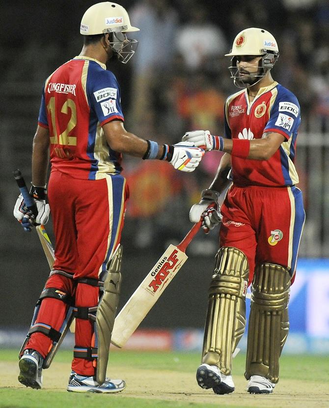 Yuvraj Singh celebrates with Virat Kohli