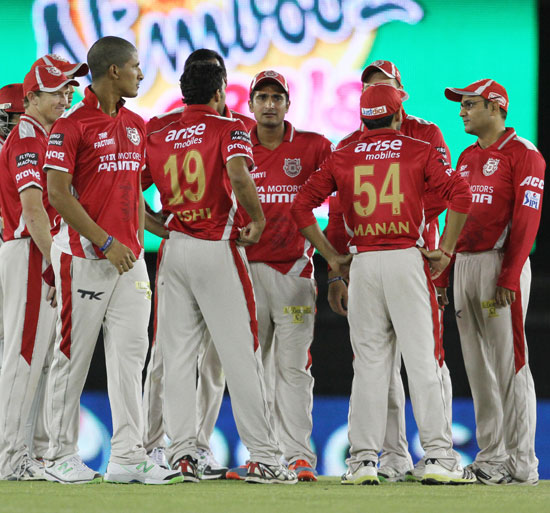 Kings XI Punjab players celebrate the fall of a Rajasthan Royals wicket