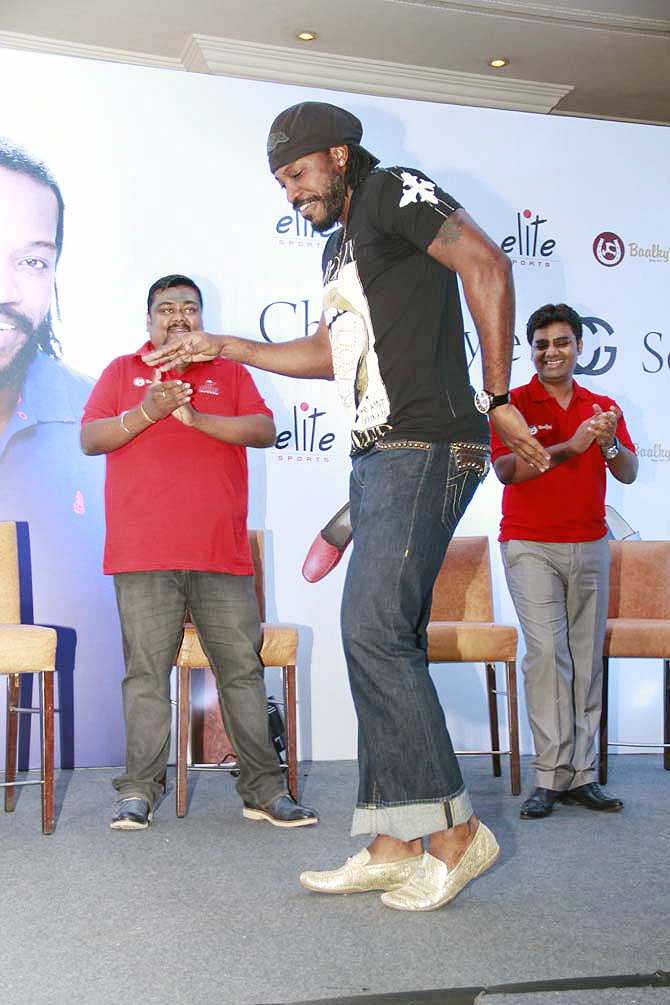 Chris Gayle does the moonwalk during the launch of his shoe brand in Mumbai on Sunday