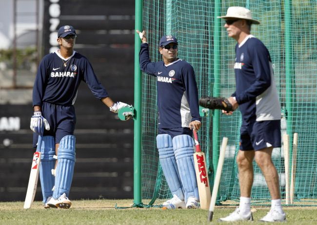 Sachin Tendulkar and Rahul Dravid look on during a practice session