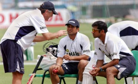 India coach John Wright (left) speaks to Rahul Dravid (right) and Sachin Tendulkar during the tour to Pakistan in 2004.