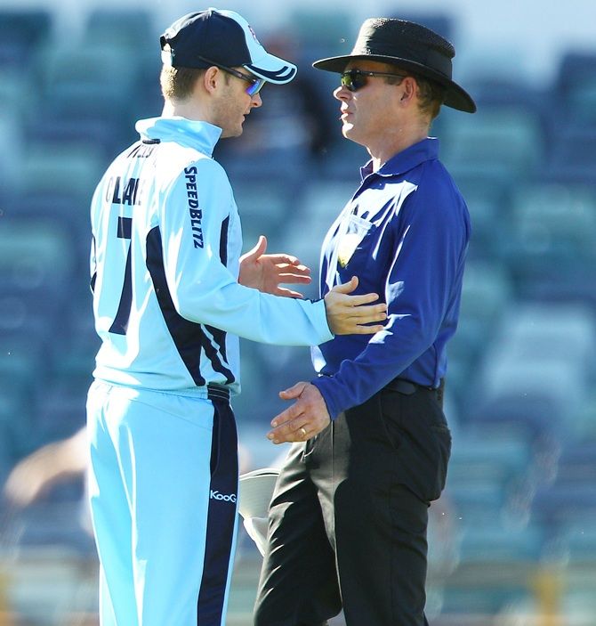 Michael Clarke with Umpire