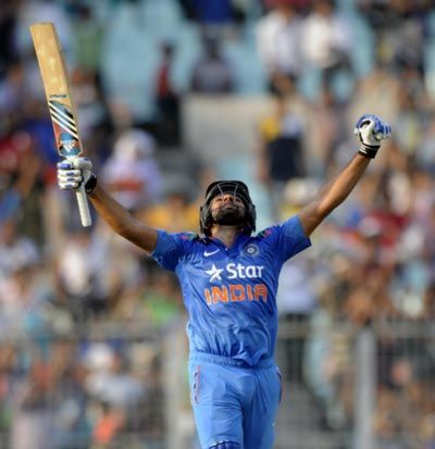 Rohit Sharma celebrates after completing a double hundred against Sri Lanka in the fourth ODI