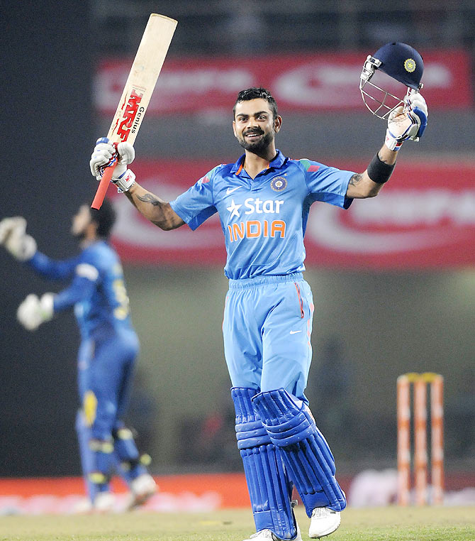 Virat Kohli celebrates his century