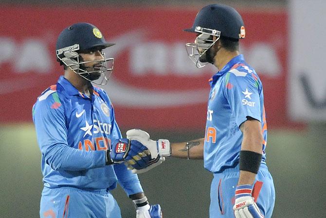 Ambati Rayudu of India is congratulated by his captain Virat Kohli