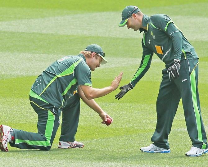 Shane Watson and Michael Clarke of Australia high five