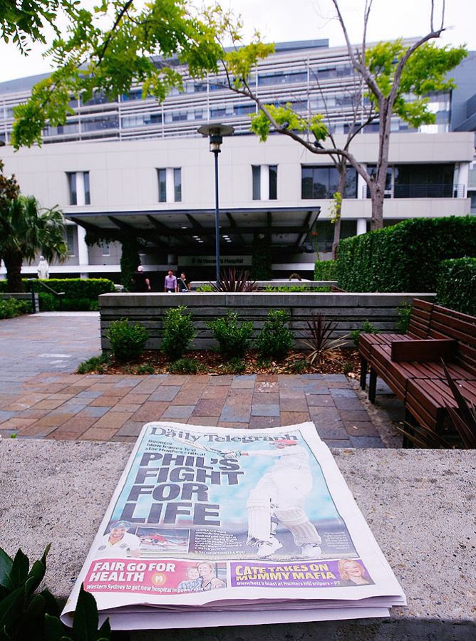 A newspaper with a cover of Phil Hughes is seen at St Vincent's Hospital in Sydney on Wednesday