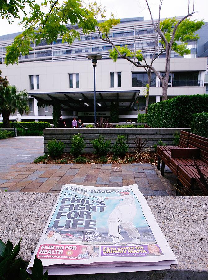 A newspaper with a cover of Phil Hughes is seen at St Vincent's Hospital in Sydney, Australia on Wednesday