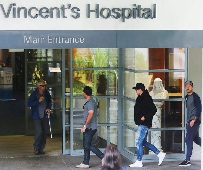 Ricky Ponting, Peter Siddle and James Pattinson arrive at St Vincent's Hospital