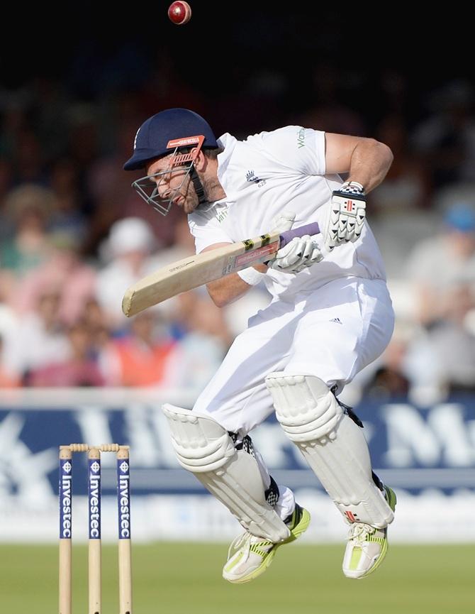 Liam Plunkett of England avoids a bouncer