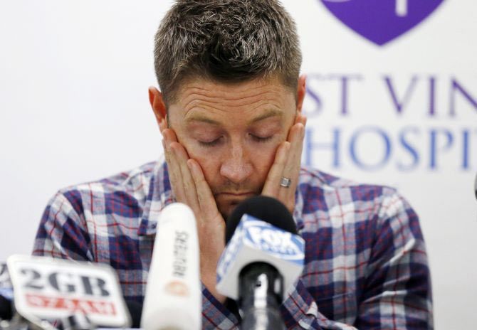 Australian cricket captain Michael Clarke pauses before delivering a statement, on behalf of the family of deceased teammate Phillip Hughes, at St Vincent's Hospital in Sydney