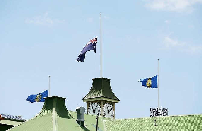 Flags fly at half mast at the Sydney Cricket Ground on Friday following the Phil Hughes's death on Thursday