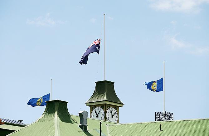 Flags fly at half mast