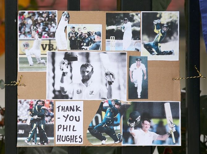 Tributes to Phillip Hughes are seen outside the ground at the WACA 
