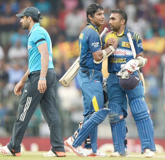 Kumar Sangakkara and Mahela Jayawardena of Sri Lanka celebrate