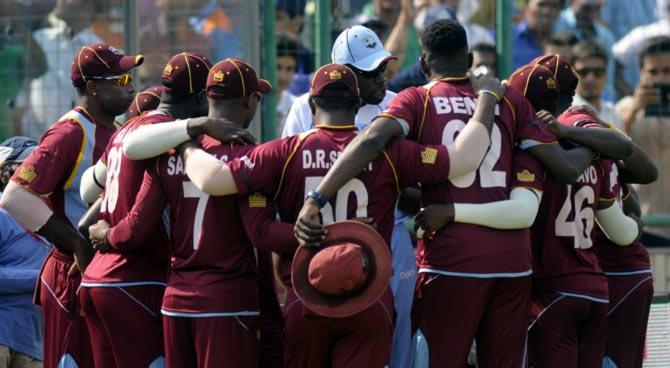 The West Indies players in a huddle before the start of the second ODI against India in New Delhi