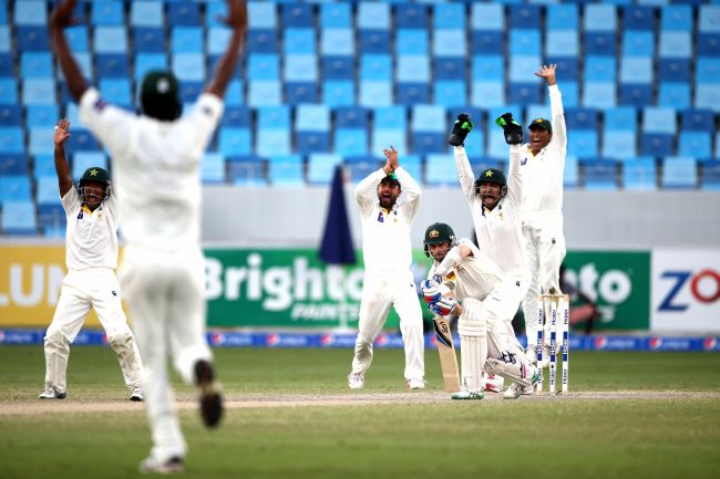 Alex Doolan of Australia is dismissed lbw by Zulfiqar Babar of Pakistan