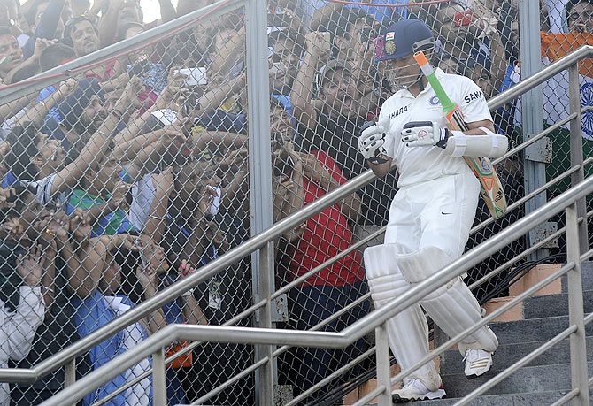 Sachin Tendulkar walks out to bat in his final Test match at the Wankhede
