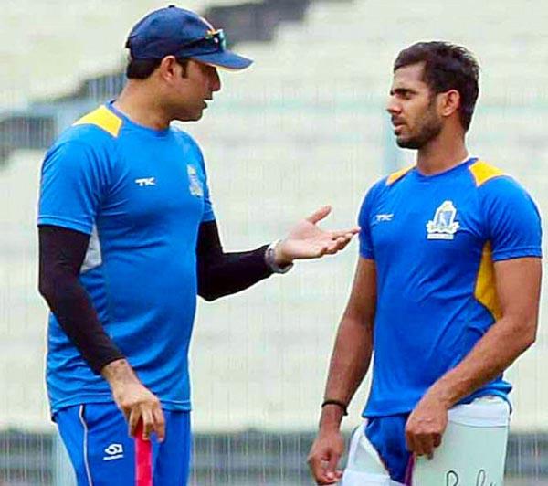 Manoj Tiwary (right) with V V S Laxman