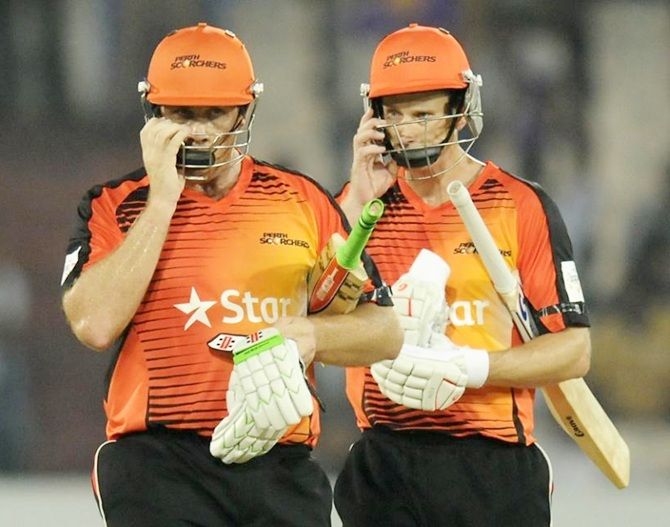 Craig Simmons of Perth Scorchers and Adam Voges