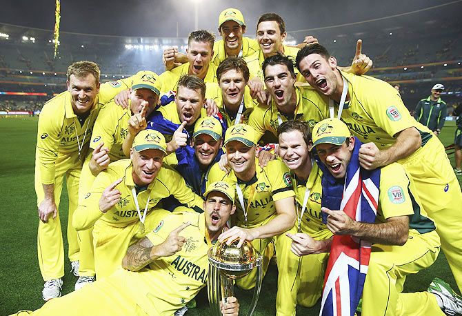 The Australian Team celebrate with the trophy after winning the 2015 ICC Cricket World Cup title at Melbourne Cricket Ground on March 29