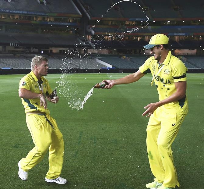 Mitchell Starc and David Warner of Australia