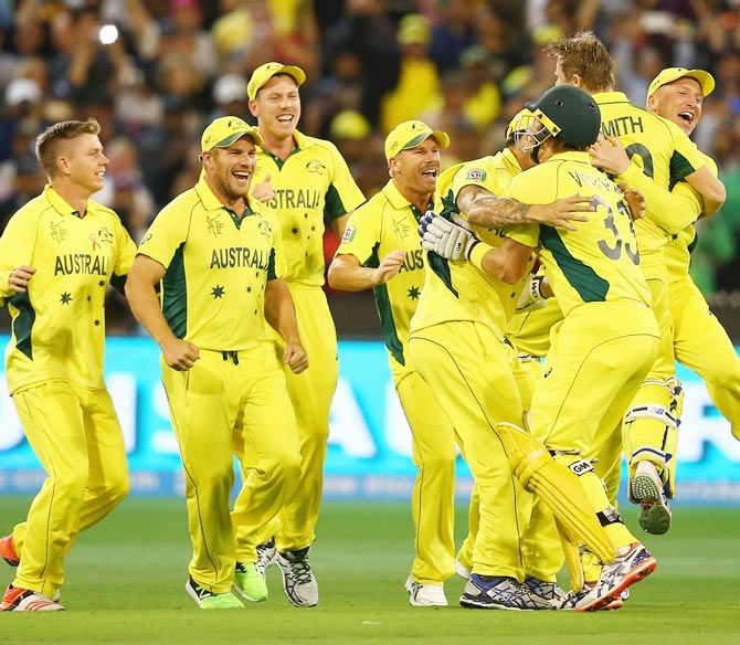Australia players celebrate victory after beating New Zealand in the World Cup final at the Melbourne Cricket Ground on Sunday