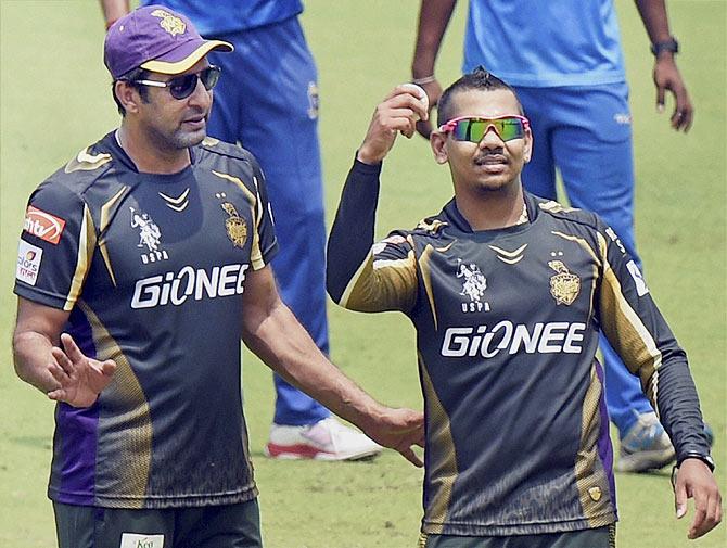 KKR player Sunil Narine and bowling coach Wasim Akram during a practice session at Eden Garden in Kolkata on Tuesday