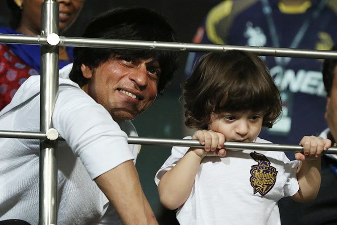 Shah Rukh Khan is all smiles as son AbRam plays in the stands
